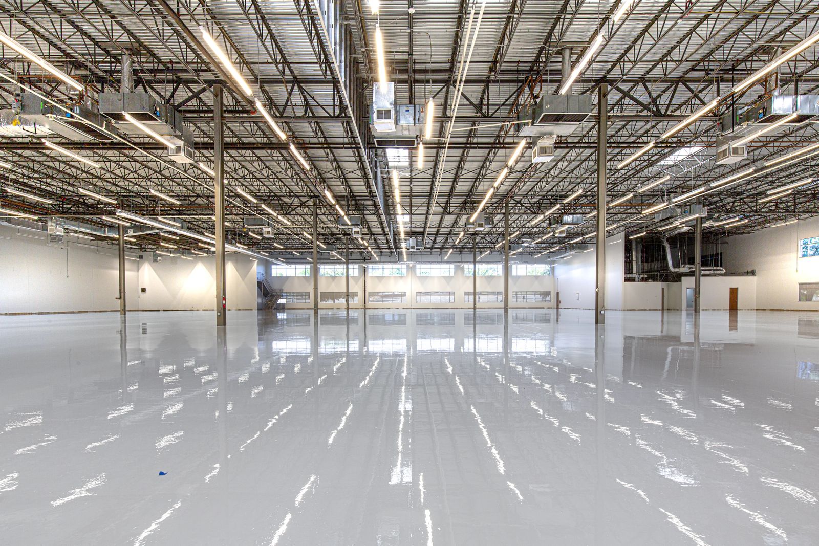 A glossy, freshly coated epoxy floor